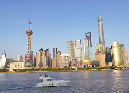 Picture the Oriental Pearl TV Tower from the Bund in Shanghai